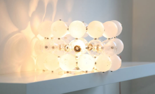 Illustration for article titled Crazy Sexy Cool Lamps, 100% Made From Bulbs